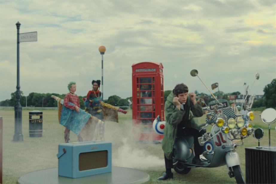 Still from John Lewis ad of mod on scooter