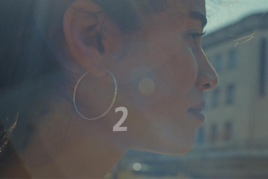 A woman with a hoop earring