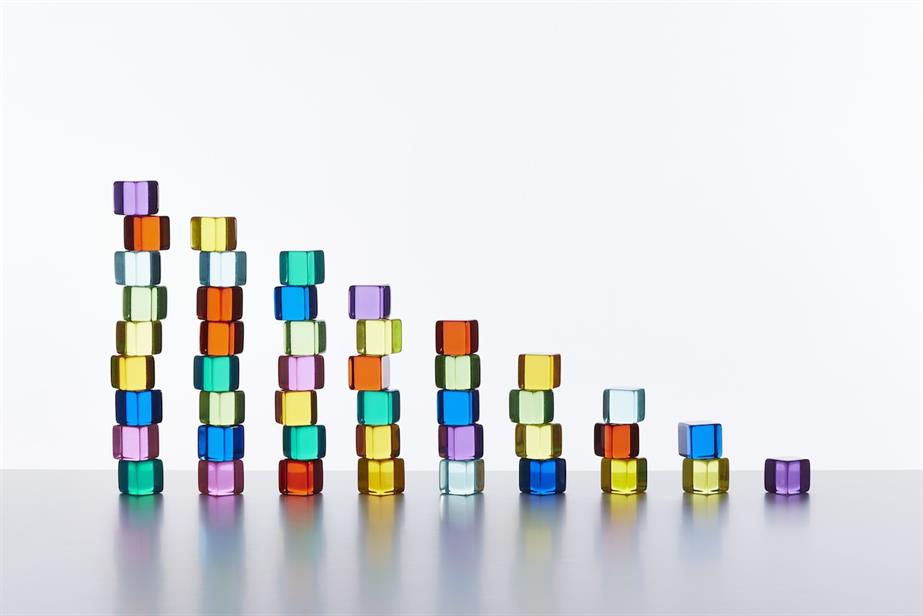 Rainbow coloured blocks stacked in descending height order